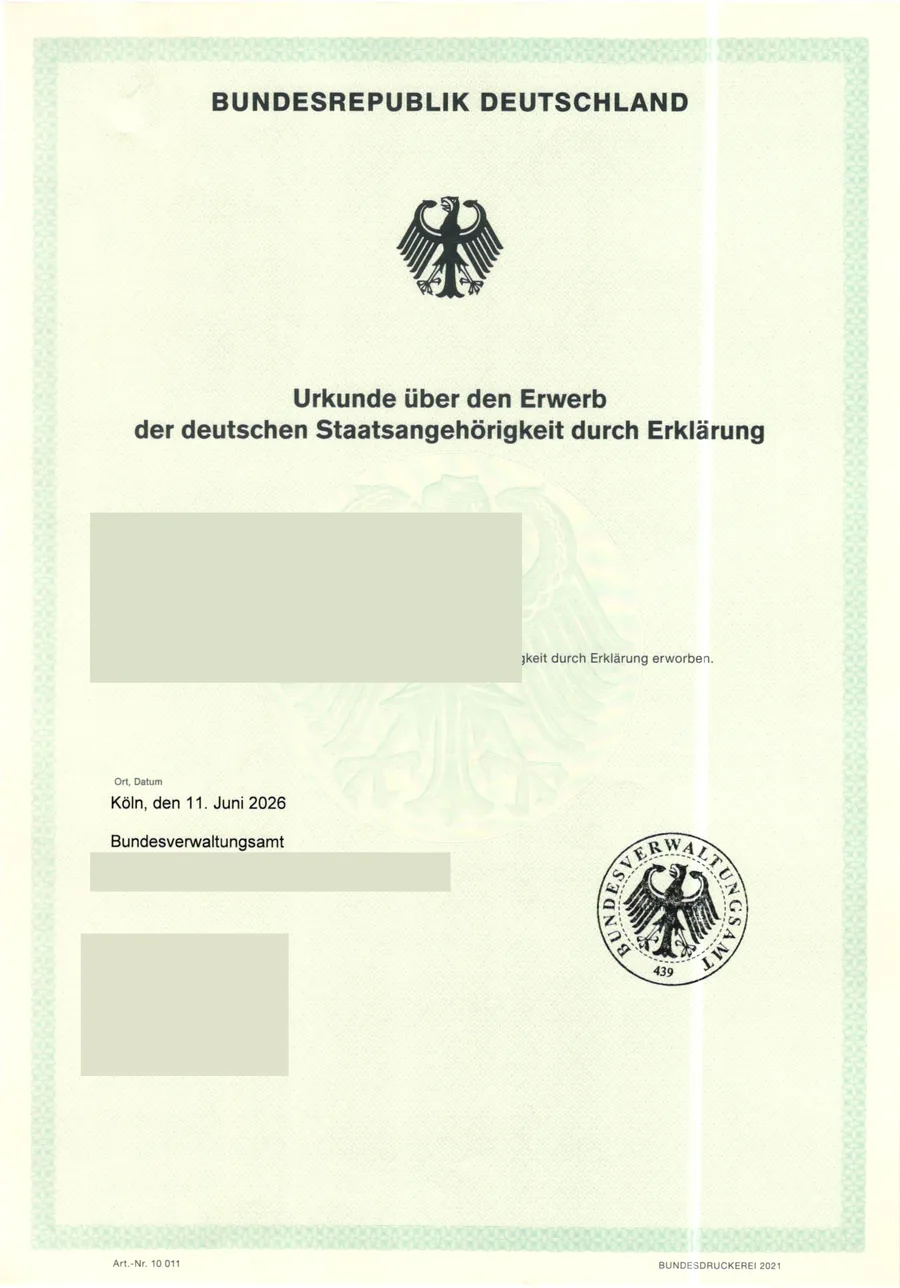 Certificate of acquisition of German citizenship by declaration, Bundesverwaltungsamt 2026, with personal data blacked out